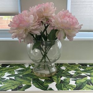 Artificial pink flowers with vase
